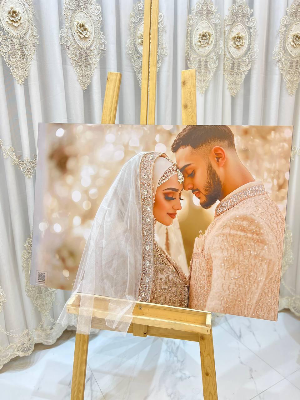 Intimate portrait of a couple, foreheads touching, styled in warm gold tones with soft bokeh